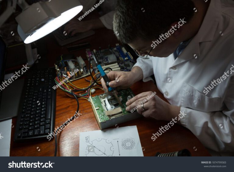 inYantra engineer working on electronic components for device development